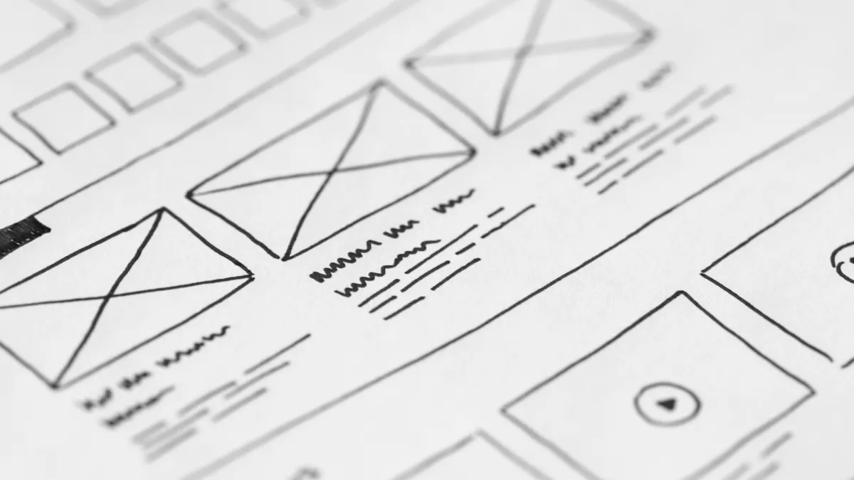 How tronicreview.com is organized Paper website wireframe sketches with page boxes